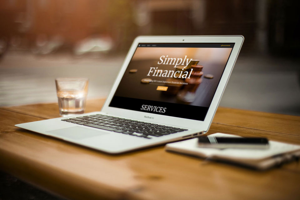 Financial website displayed on laptop